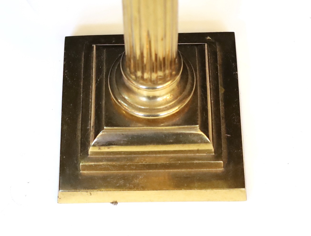 A late Victorian lacquered brass oil lamp with cut glass reservoir, Vaseline glass shade and flue, height overall 82cm
